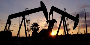 This Thursday March 6, 2014 photo shows the setting sun behind pumpjacks operating at the Inglewood oil fields in the Baldwin Hills area of Los Angeles. The Los Angeles City Council has taken steps to prohibit hydraulic fracturing, or fracking. (AP Photo/Richard Vogel)